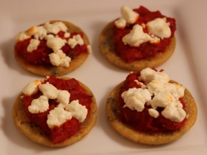 Mini Socca Pizza with goat cheese and red pepper eggplant tapenade