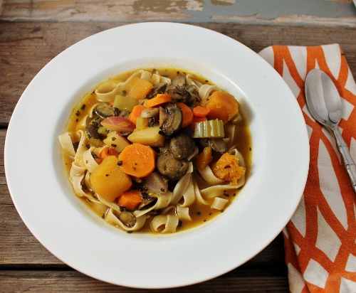 hearty mushroom and veggie soup with egg noodles 